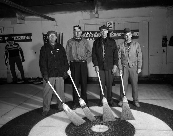 Laurie Carlson, skip; William Marling Jr., Byron Ostby, and John Anderson are members of the Laurie Carlson rink, who won the first event in the finals of the Madison Curling Club's first bonspiel of the year.