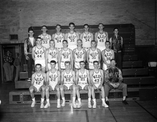 Group portrait of West High School Basketball Team.