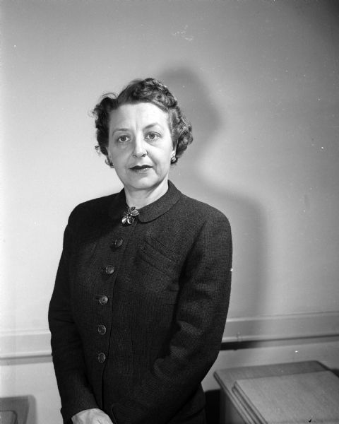 Portrait of Mrs. Margaret Nelson, teacher-coordinator at the Madison Vocational and Adult school's homemaking department. She was preparing to appear on WHA-TV to advocate eating low-calorie foods like fruit; walking only a mile and a half a day; and to avoid nibbling high-calorie snack foods.