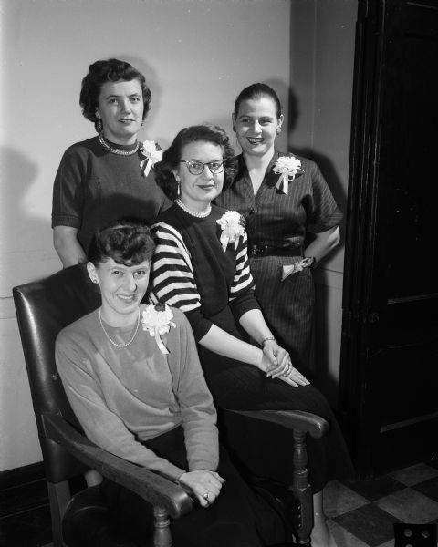 Group portrait of the new officers of the Madison Policemen's Protective Association auxiliary. Seated from left to right: Mary Tiedt, president and Janis Crandall, treasurer. Standing are Mrs. Eugene Prieve, secretary and Arlene F. Hoffman, vice-president.