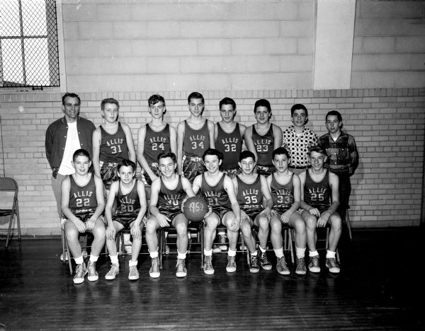 Group portrait of the Frank Allis School basketball team. They were undefeated and won the Madison Suburban Elementary School League championship.
