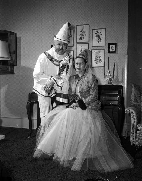 John and Mae Taggett dressed as a British court jester and an elegantly dressed "lady of the court" at the Madison Art Association Beaux Arts Ball.