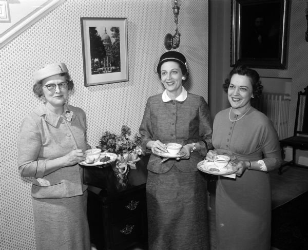 Left to right, Mrs. George M. (Marjory) Keith, 4158 Cherokee Drive; Mrs. C.K. (Jean) Alexander, 962 Waban Hill and Mrs. Leslie J. (Lenora) Lippert, 4145 Hiawatha Drive, enjoy refreshments at the governor's mansion in Maple Bluff. The "brunch" was hosted by their former neighbor, Mrs. Vernon W. (Helen) Thomson.