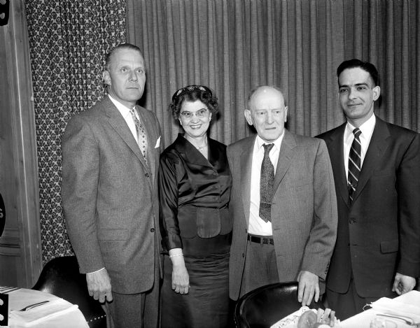 Herbert B. Whipple, second from right, is honored at a dinner to celebrate his birthday and retirement. He is retiring as supervisor of incorporations in the secretary of state's office. Others are, left to right: Secretary of State Robert C. Zimmerman; his wife, Minnie, and Roderick Lippert, who will take over Whipple's position.