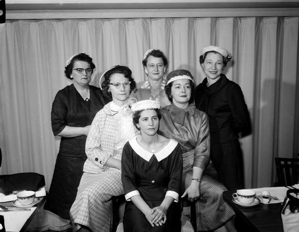 Group portrait of members of the decorating committee for the Municipal Bowling Association luncheon. Josephine Severson sits in the foreground, and the back row includes, (left to right): Mrs. Milan Miller, Edith Berg, Ruth Garvoille, Betty Reese, and Doris Burgdorff.