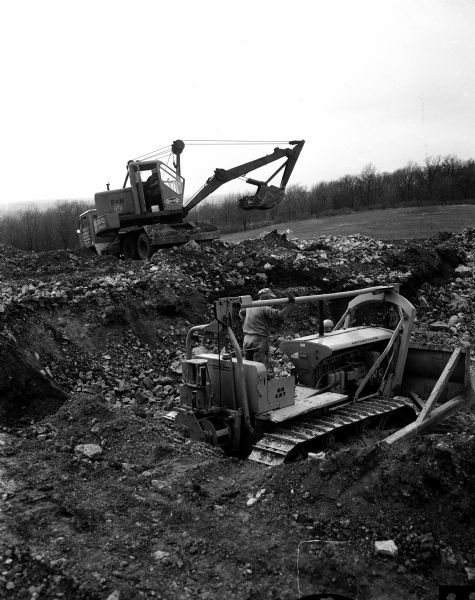 Bulldozers and steam shovels prepare the site for the future University of Wisconsin Observatory site near Pine Bluff.