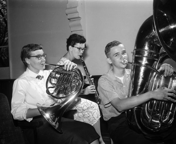 Carol Jack, Janet Saevre, and Gilman Voss are among the 5,000 high school musicians at the State Solo-Ensemble Festival held in Madison.