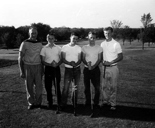 Group portrait of the West High School golf team. Left to right: Coach Clark Byam, Erwin Smith, Dick Quintana, Don Christianson, and Don Quam.