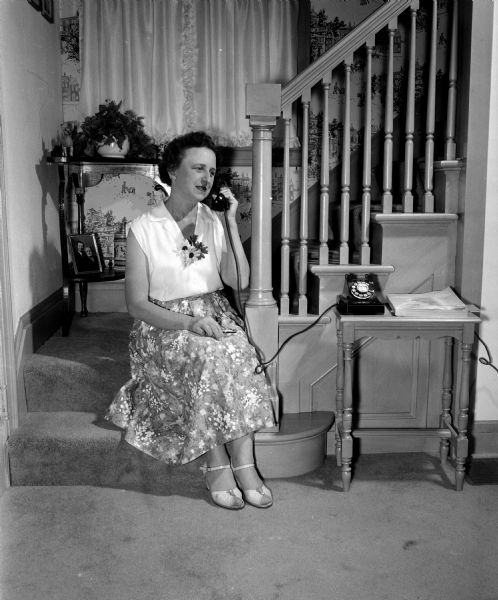Florence Gill, a volunteer blood donor for the Red Cross, receiving a call from a volunteer requesting a donation.