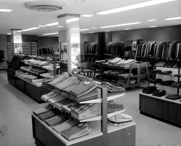 Interior view of the new Edwin O. Olson & Son clothing store at 555 State Street.