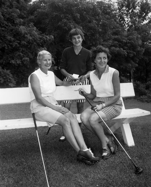 The three women golfers with low handicaps wait to play in the inter-club play at Blackhawk Country Club. From left are:Lindley Sprague of Maple Bluff, Lorraine Burke of Blackhawk, and Margaret Hundt of Nakoma.