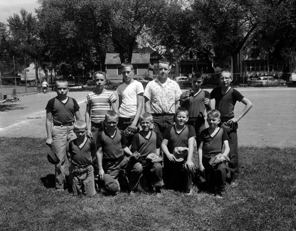 Group portrait of Allen's Barbers boy's baseball team who will be out to add the East Midget championship to their East Midget Central No. 2 League pennant.
Front row: Mike Henlin, Dave Henline, Randy Stapleman, Mike Dayton, Billy Lister.  Back row: Jim Craig, Tom Buglass, Bill Murphy, Terry Turnquist, Tim Plante and Les Claunch.