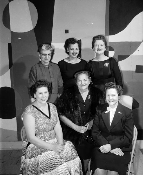 Group portrait of members of the Madison Woman's Bowling Association who were honored at the "600" Club dinner. In front, left to right, are: Jo Sweeney, Ella Manke, and Vi Ehl. In back, left to right, are: Dorothy Sutton, Ora Ehl, and Loretta Elliott.