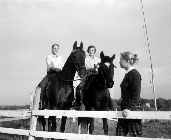 Girls participate in fall try-outs for the Madison Hunt Club at Nob Hill Ranch. The club is for high school girls who ride horses. Left to right are: Martha Dubielzig, Kris Erickson, and Karen Peterson, all Wisconsin High School students.