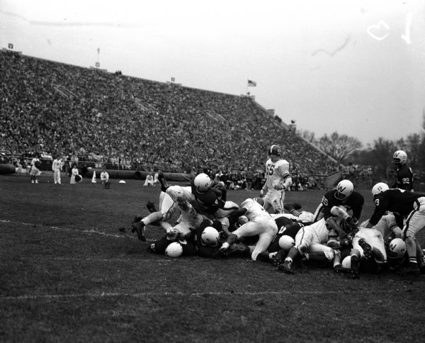 Wisconsin halfback Danny Lewis scores a touchdown against Michigan State in their game at Camp Randall.