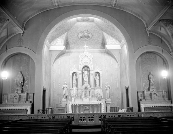 Interior view of the ornately decorated chancel area of St. Patrick's Catholic Church, located at 410 East Main Street.
