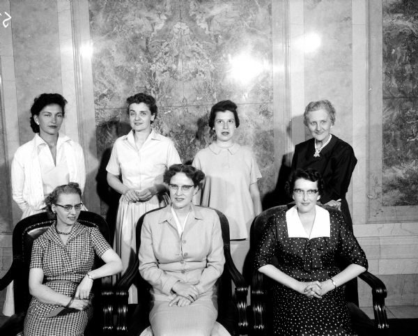 Group portrait of the wives of the seven members of the Wisconsin Supreme Court.