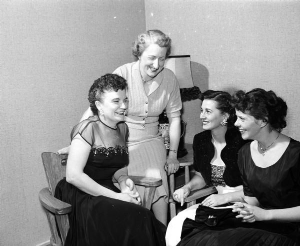 Mrs. Jack McCarron (left), Mae Boyd, Mrs. Irv Skoyen and Mrs. D.W. Kirner, employees of the Pure Oil Co. Madison office, are leaving the company or being transferred.