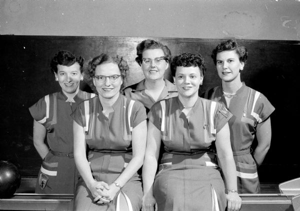 Idle Hours women's bowling team sets city season record. Front left to right are team members Georgia Meiller and Eleanor Davis. Back row are Betty Sydow, Doris Hanson, and Joan Kluge.