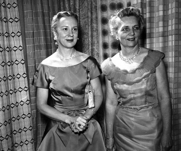 Two women attend the annual banquet for members of Matrix, an organization for women journalists; they include June Brown, left, and Margaret Russell, both alumnae of the Theta Sigma Phi journalism sorority.