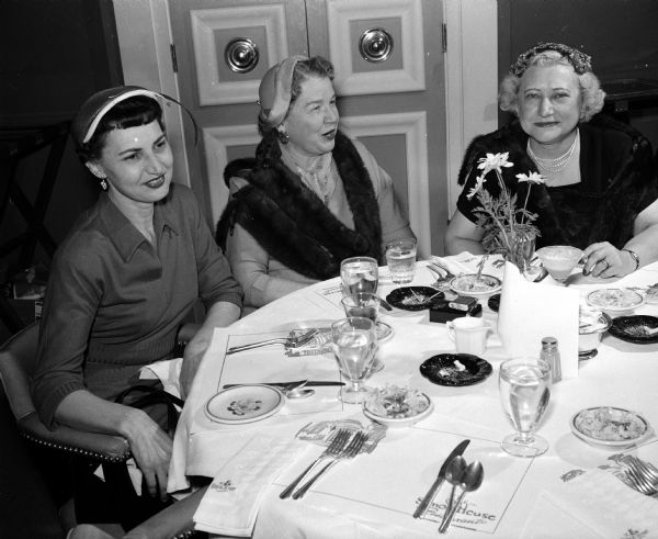 Three bowlers sit around a table at the Women's Bowling Association's spring luncheon. From left are: Mrs. Dorothy Golden, Mrs. Ruth Lievan, and Mrs. Helen Stephenson.
