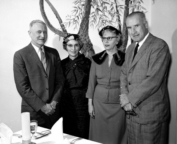 Among the guests at an American Cancer Society dinner are Madison Public Schools superintendent Philip H. Falk with his wife, Ethel (left); and Mrs. Dorothy Hall with her husband, George.