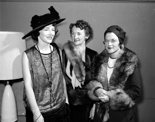 Image of three Shorewood Hills women in costume depicting fashions of the 1920s. They are Mary Olsen, Beatrice Cartwright, and Bette Cain.