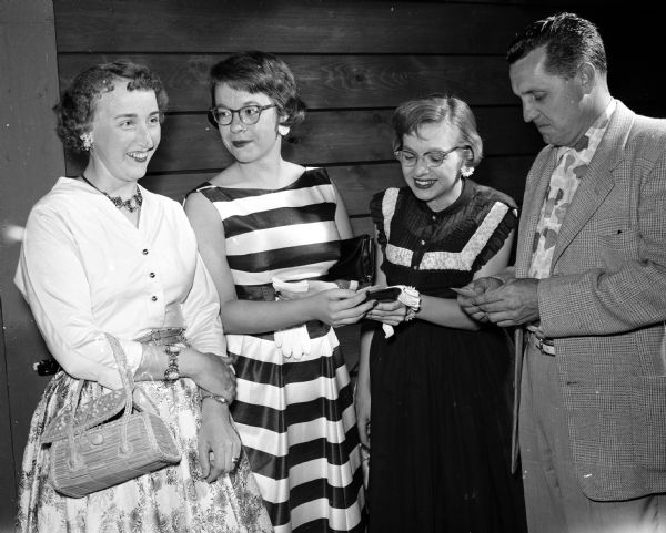 Mrs. Robert Ott (left), Marianna Steele, Althea Steele and Robert Ott attend the first performance of "Bell, Book, and Candle" at the opening of the Green Ram Theater near Baraboo.
