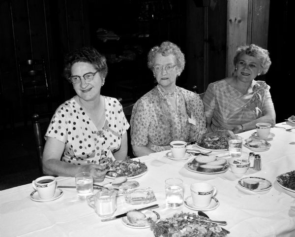 Cora Vogel, Mary Stephenson, and Alice Uehling attend the Opti-Mrs. Luncheon at Kennedy Manor.