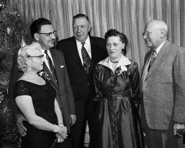 Attendees at a Hult Capital Garage "family" party include, from left: Vey and Lester Simmons; Jarl and Emma Olson; and K. Kogelmann.