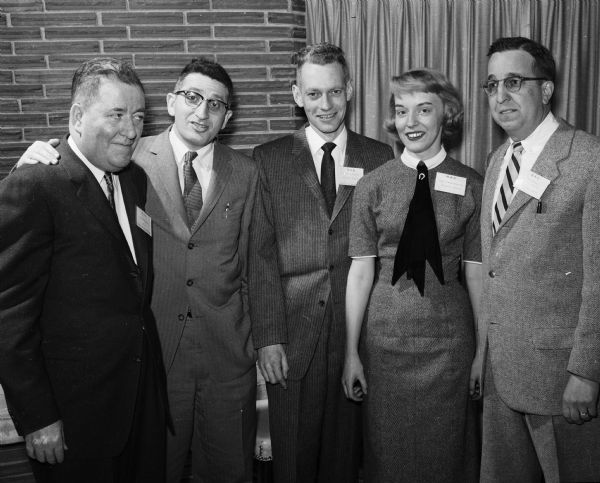 Five members of the Madison Advertising Club are shown. They are (L-R) Robert Loomer, WKOW-TV; Martin Wolman, business manager of Madison Newspapers Inc.; Gordon Johnson, Susan Schneiderwind and Luther Bowers; all of Madison Newspapers.