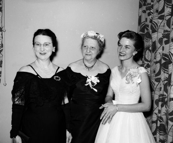 Two guests of honor (left to right) attend the Matrix Table: Ineva Baldwin and Rosa Fred. They are shown with Jane Jackson of Viroqua, president of Theta Sigma Phi, which sponsors the banquet.