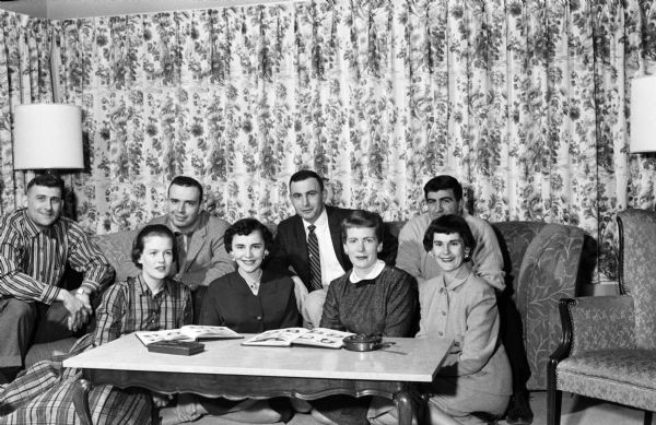 The committee chairmen for Edgewood High School's Class of 1948's 10-year reunion meet to formulate plans. In the front row, left to right, are: Sharanne Endres, Marion Alt, Martha Ann Dolohanty, and Janet Roth.  In the back row, left to right, are Jim Dolkert, Joe Meagher, Philip Roth, and Michael Gentelli.
