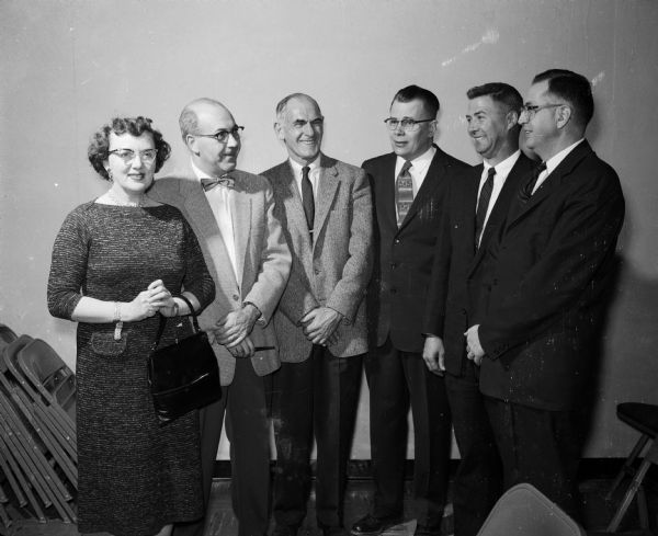 Officers present at a Madison Restaurant Association open house include, from left to right: Rumalia Tiederman, state director; Hans Ruhig, treasurer; William Ostrowsky, secretary; and directors Basil Berggran, Lyle Poore, and John Kelly.