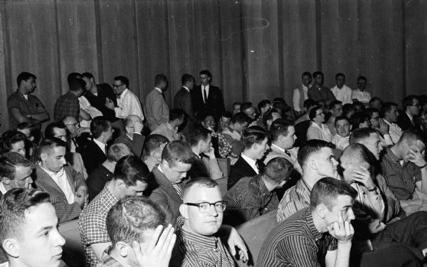 Spectators and defendants mingle in a crowded County courtroom for a hearing on a Langdon Street demonstration involving 1,000 to 2,000 students.