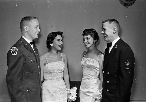 Keith Campbell (left), Ann Arbor, MI; Noreen Gastine, Ann Arbor, MI; Beth Knope, and Jim Thompson attend the University of Wisconsin military ball, sponsored by the three ROTC branches of service at the University.