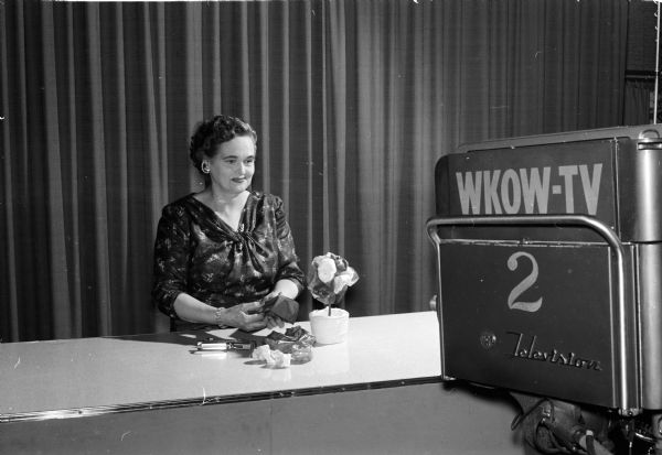 Madison television programs are hosted by Madison women and cover topics like cooking, arts, fashion and crafts. Fern Fowler demonstrates a plant made of tissue paper on her "how-to-do-it" program, "The Fern Fowler Show", seen once a week on WKOW-TV.