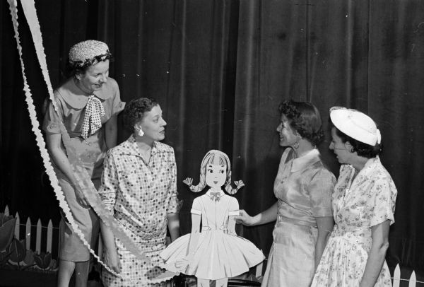 Jeannette Von Gunten (left), Dorothy Uehling, Charlotte Spohn and Betty Cotterman attend the Westmorland Community Association Annual Party held in the auditorium of Our Lady Queen of Peace Church.