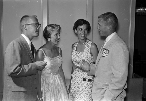Bruce and Judy (Sherlock) Wencel, left, and Maureen and Mike Torphy attend the West High School Class of 1948 Ten Year Reunion.
