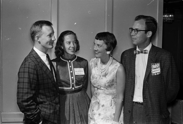 Ed and Marianne Hobbins (left) and Beatrice and Richard Wencel attend the West High School Class of 1948 Ten Year Reunion.