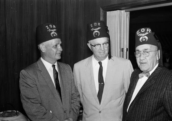 Three Monroe Shriners attend a meeting in Madison. They include, from left, Bruce Blum, Pat Schoonover, and Roland Blaha.
