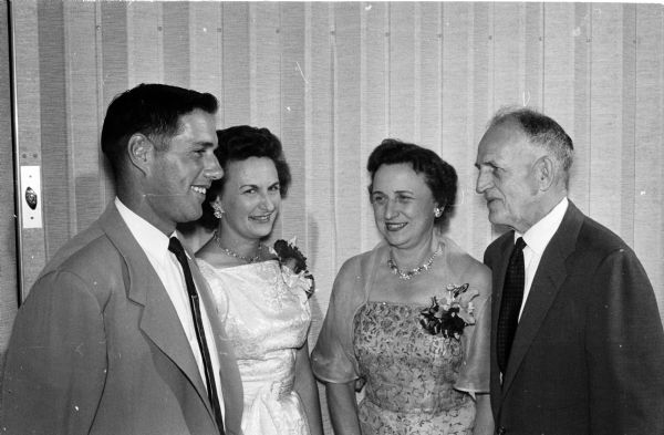 William and Eula Hiltz and Florence and Chester Gill chat during the University of Wisconsin Summer Session pre-prom dinner.