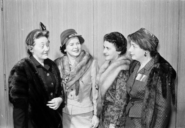 View of the annual meeting of the Madison Visiting Nurse Service at the Blackhawk Country Club. Pictured are members of the public relations committee, from left to right: Meredithe A. Shuler, Jeanne I. Weber, Allen (Ellen?) R. Plater, and Elizabeth B. Morton.