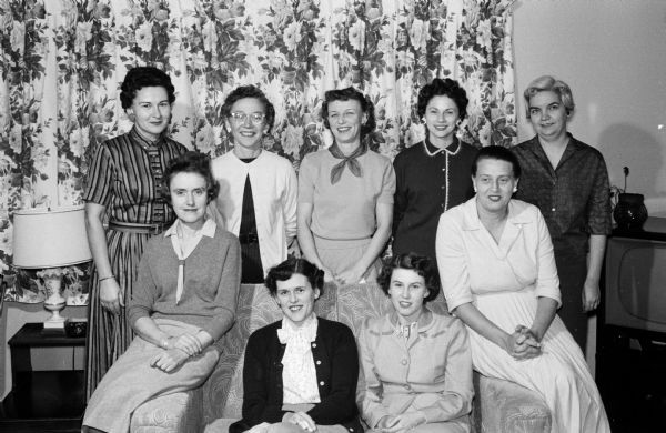Group portrait of officers and executive board member of the new women's auxiliary for Firefights' Local 311. Seated, left to right: Mary Lippolt, June Sullivan, Betty Wilcox and Edith Bokinn.  Standing: Agnes Kammer, Minnie Martinelli, Lorraine Couture, Elizabeth Bavery and Rosalie King.