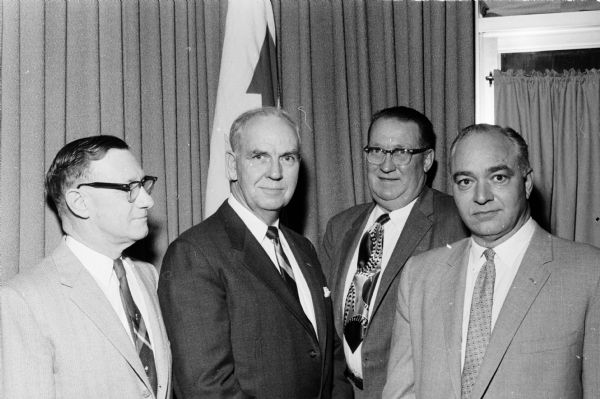 The annual Dane County 32nd Division  Red Arrow Veterans Day party was held at the Towne Club. Guests included World War I and World War II division members and their wives. Brig. General Herbert Smith, assistant 32nd division commander, was the guest speaker. Left to right are Elmer Woldbogel, Herbert Smith, Lee Imhoff and William Curkeet.
