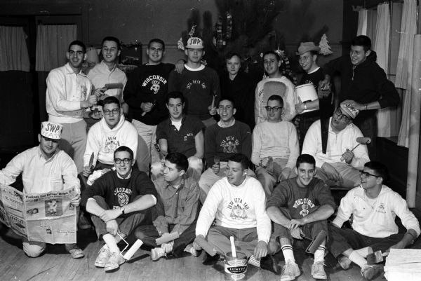 Members of the Zeta Beta Tau fraternity at the University of Wisconsin spend time painting and repairing at the Atwood Avenue Community Center as part of the fraternity's program to contribute to community life in Madison. Shown (left to right) in the first row are: Ronald Flate, Cleveland, OH; Chuck Caplan, Flint, MI; Art Chapman, Milwaukee; Phil Fishman, St. Louis; Steve Leshin, Chicago; and Howie Schechter, Chicago. Shown in the second row are: Roger Katz, Marinette; Stu Schlesinger, New York City; Mike Litwak, Cincinnati; Neal Mancoff, Chicago; and John Safinger, Chicago. Shown in the third row are: Beber Helburn, Cincinnati; Dick Sweet, Milwaukee; Steve Redler, St. Louis; Howard Naimon, Milwaukee; Joanna Sherman, center director, Robert Rosenbuam, Milwaukee; Steve Weif, Chicago; and Richard Kulwin, Chicago.