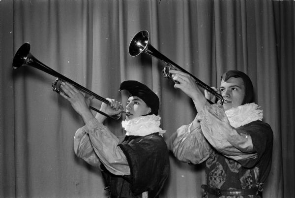 Nakoma's Twelfth Night Party features the historical pageantry of the Twelfth Night tradition. Royal trumpeters who heralded the evening's festivities at the Nakoma School are Robert Dicke and John Yount.