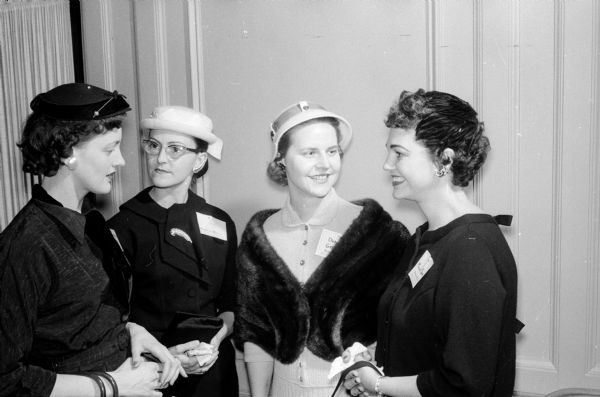 Four guests attending an anniversary tea of the Who's Who Club at the YWCA, 122 State Street are, left to right: Kathleen Masden, Jane Pawenski, Dorothy Greiert and Minnie Swan.
