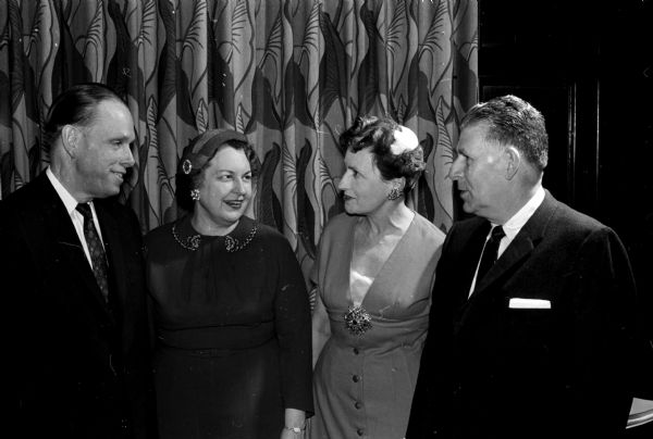 University of Wisconsin President Conrad A. Elvehjem (left), his wife, Constance, and Dr. and Mrs. W.P. Hildebrand, Menasha, president of the State Medical Society of Wisconsin, attend the State Historical Society Founder's Day banquet.