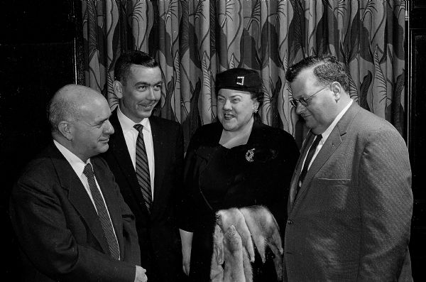 Attending the State Historical Society Founder's Day banquet are, left to right, W.B. Hesseltine, University of Wisconsin history professor; Dr. Donald R. McNeil, acting director of the State Historical Society; Mrs. W.I. Sanders, secretary of the Fond du Lac County Historical Society, and her husband.